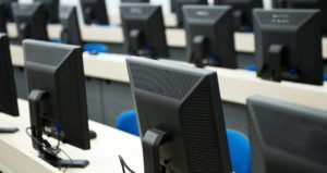 Image of computers on desks for disaster recovery